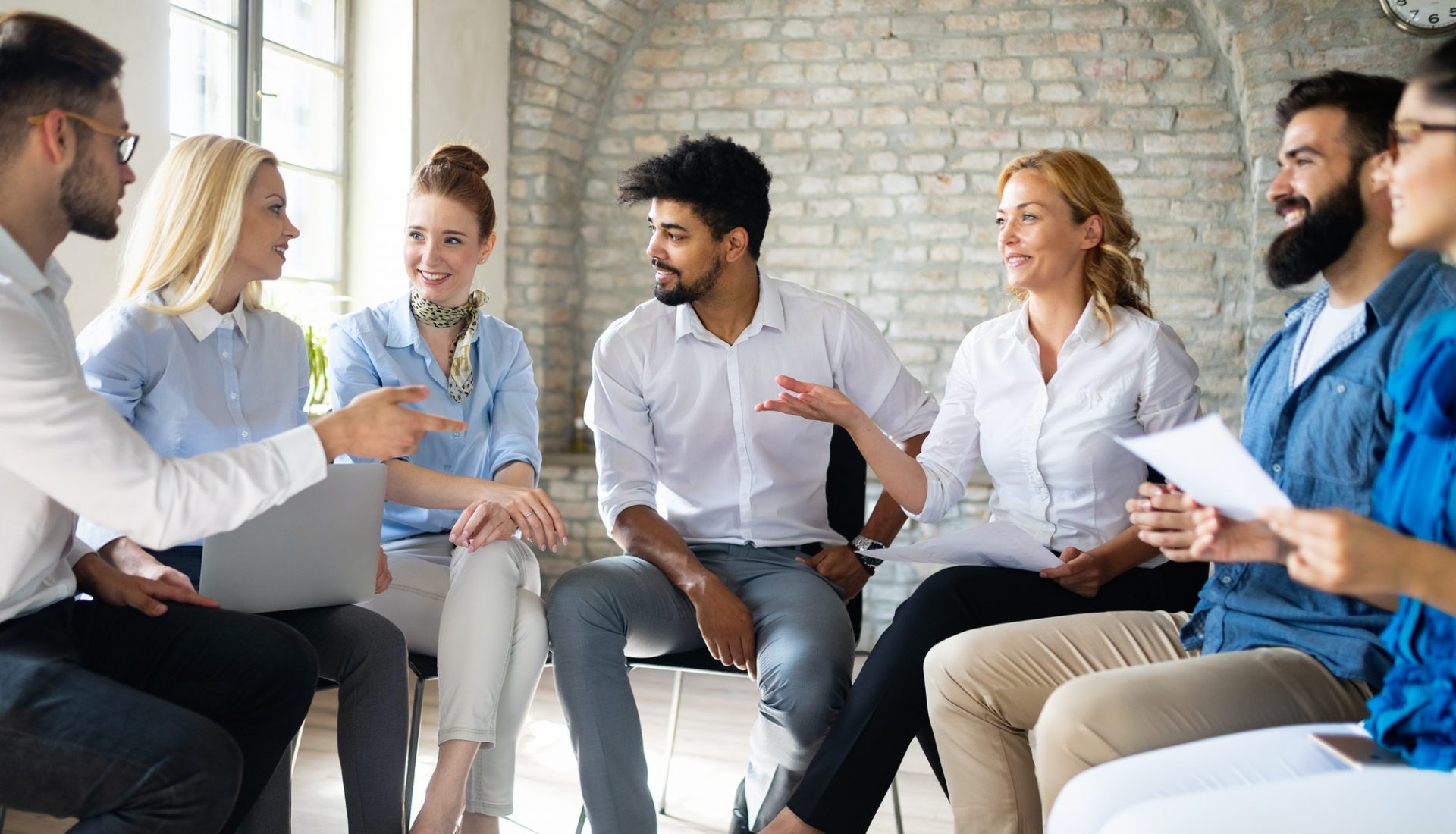 startup-business-team-on-meeting-in-modern-bright-office-interior-brainstorming-working-on-computer